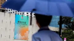 This file photo taken on 29 June 2020 shows a government advertisement promoting China's planned national security law, displayed on the city hall building in Hong Kong