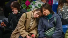 україна