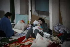 mother holds a child ukraine