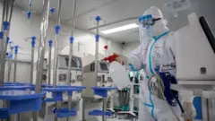 Nurse disinfects hospital in Wuhan