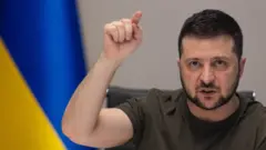 A handout photo made available by the Ukrainian Presidential Press Service shows Ukrainian President Volodymyr Zelensky reacting during an interview via videolink with Russian media, in Kyiv (Kiev), Ukraine, 27 March 2022
