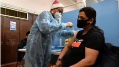 کووڈ، برطانیہ، بوسٹر شاٹ