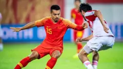 Yennaris in action for Chinsa in a friendly against Tajikistan in June