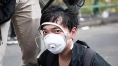 HONG KONG, CHINA - NOVEMBER 18: Police arrest anti-government protesters at Hong Kong Polytechnic University on November 18, 2019 in Hong Kong, China. Anti-government protesters armed with bricks, firebombs, and bows and arrows fought with the police at university campuses over the weekend as demonstrations in Hong Kong stretched into its sixth month with demands for an independent inquiry into police brutality, the retraction of the word "riot" to describe the rallies, and genuine universal suffrage. (Photo by Laurel Chor/Getty Images)