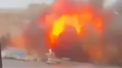 Video show a strike targeting government offices in central Kharkiv, Ukraine.