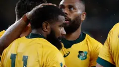 Australia celebrate Marika Koroibete's try