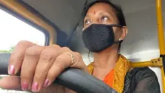பெண் ஓட்டுநர்