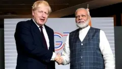 ਨਰਿੰਦਰ ਮੋਦੀ ਅਤੇ ਅਤੇ ਬੋਰਿਸ ਜੌਹਨਸਨ, ਜੀ-7