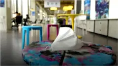 మాస్కులతో కుర్చీల తయారీ