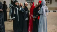 Ladies wey dress in Abaya
