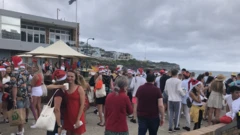 Young revellers at the Christmas backpacker party in Bronte