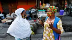 Obinrin meji n sọrọ