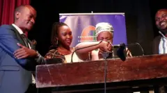 Umugore wasazwe n'ivyishimo
