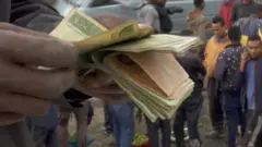 ብር የሚቆጥር ሰው