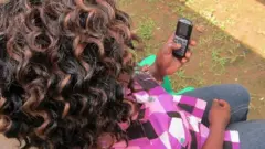 Uganda mobile phone user