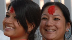 दशैँको टीका लगाएका दुई महिला