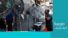 العراقيون يعانون قيظ الصيف وانقطاع الكهرباء التام