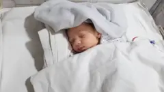 Amina di new born baby wey survive two gunshots