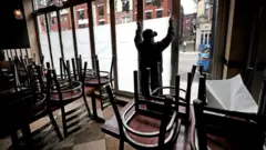 A restaurant closes its doors