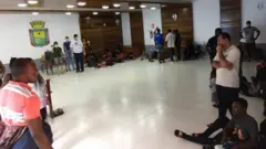 Haitianos na sede da Prefeitura de Assis Brasil