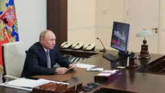 Путин