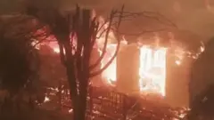A home burning in Mallacoota