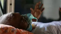কোভিড রোগী