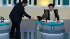 در بخشی از مناظره سوم که جنجال برانگیر شد، آقای همتی فهرستی از اسامی بدهکاران بزرگ بانکی را که بر روی کاغذ نوشته شده بود روی میز ابراهیم رئیسی گذاشت.