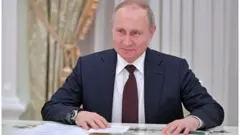 Путин