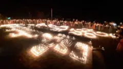 ညဘက်မှာဆီမီးခွက်ထွန်းဆုတောင်းတာပဲလုပ်ပါတယ်