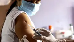 રસી