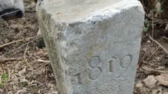 The border stone engraved with the date 1819