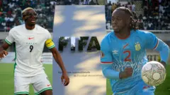 Nigeria forward Victor Osimhen and Aaron Wambisaka of DR Congo dey in-between Fifa Logo