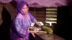 lady moving furniture flood