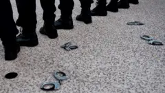 Police handcuffs lying on ground in Marseille, 11 Jun 20