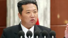 North Korean leader Kim Jong Un attends a plenary meeting in image released on 28 December