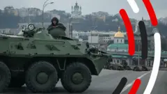 Tank with soldier sticking head out