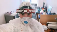врач