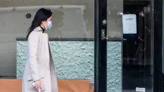 беткап кийген кыз