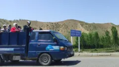 унаадагы кишилер