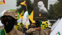Kelompok militan Abu Mahdi-al-Muhandis melancarkan aksi protes atas pembunuhan Qasem Soleimani oleh AS.