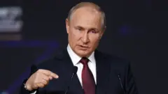 путин