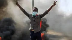 Protester against arrests demonstrates in Khartoum