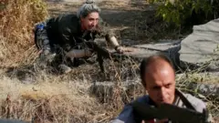 Une combattante sur le front