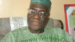 pA hASSAN sUNMọNU