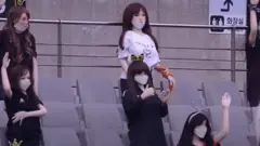 Dolls in stand