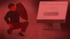 Čovek koji se štitom brani od računara