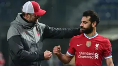 Jurgen Klopp (left) and Mohamed Salah (right)