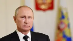Путін