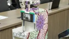 Roboti